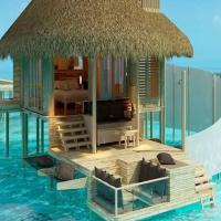 Stay in Hut Over The Water in Maldives